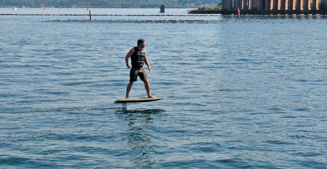 Guy Riding eFoil Board