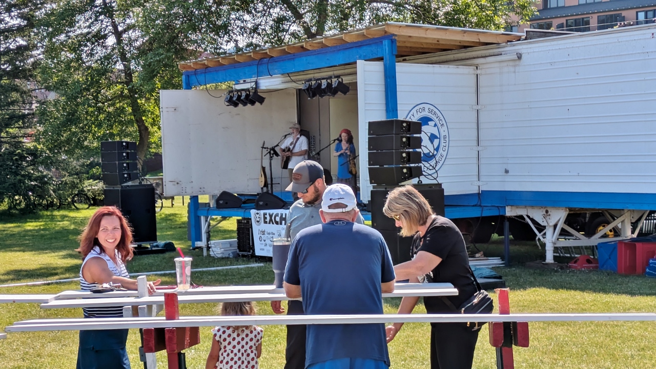 Grabbing a Bite to Eat While Band Plays