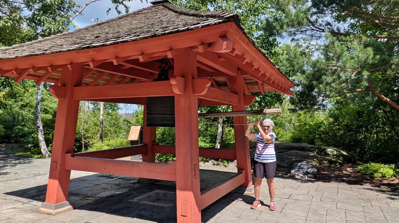 Sandy Takes Her Turn to Ring Ohara Peace Bell