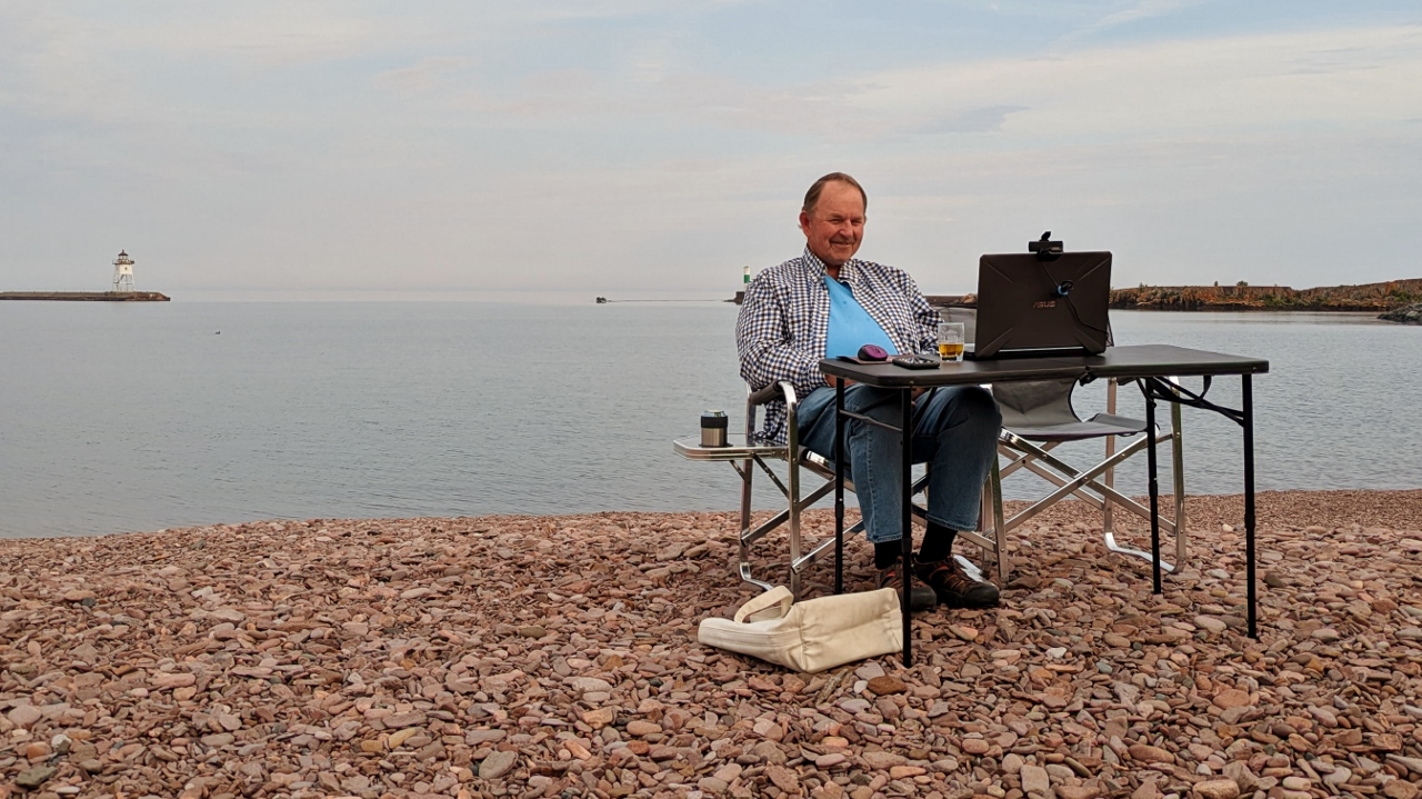 Bill Sets Up for Family Zoom from Beach