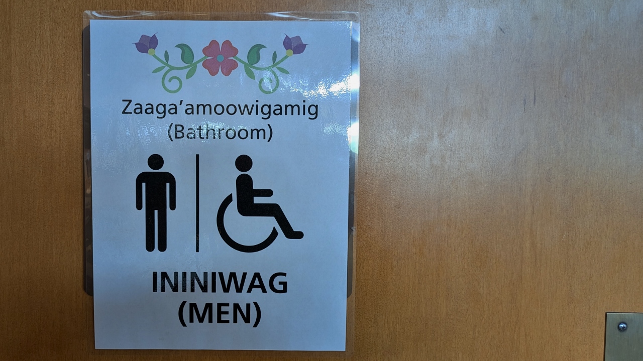 Bilingual Bathroom Sign in English and Cherokee