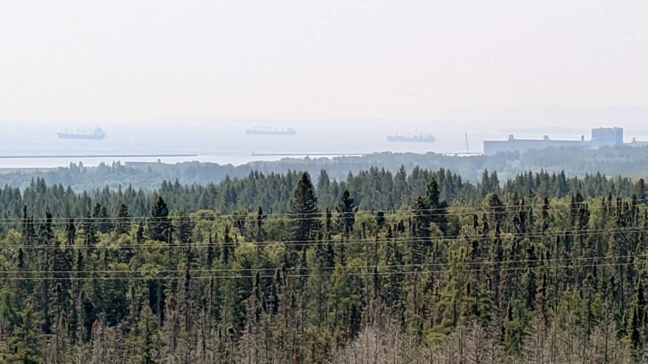 Wild Fire Smoke Nearly Obscures Waiting Bulk Carriers