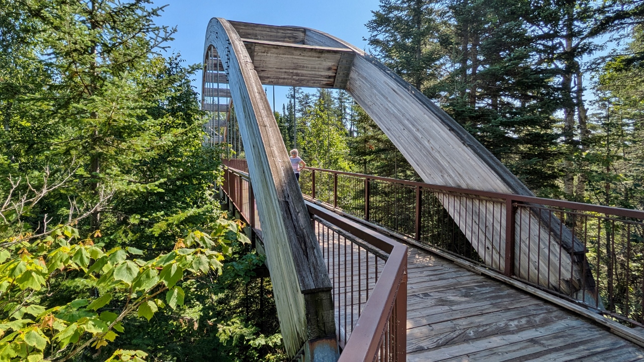 Walk Continues Across a Substantial Foot Bridge
