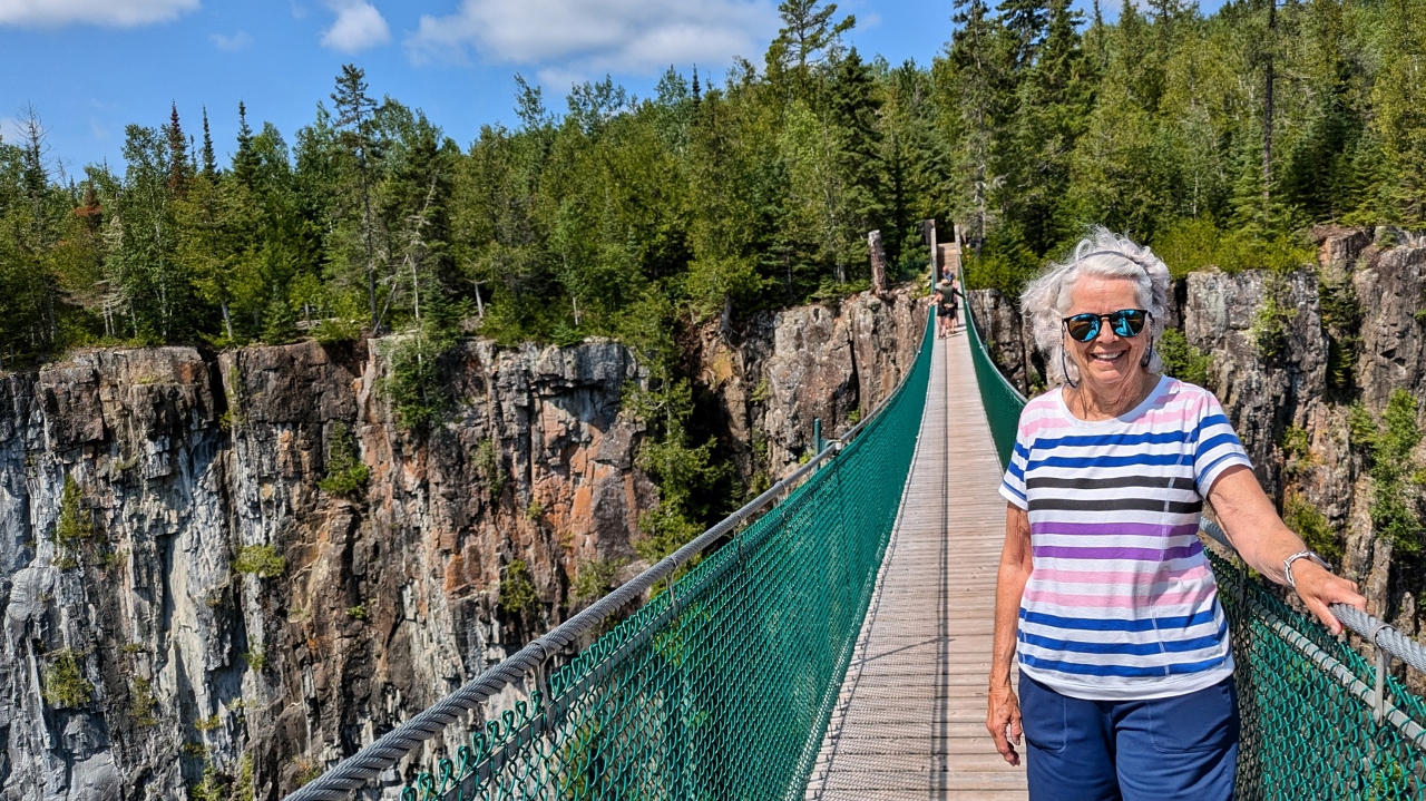 Sandy Poses at Eagle Canyon’s Long Bridge