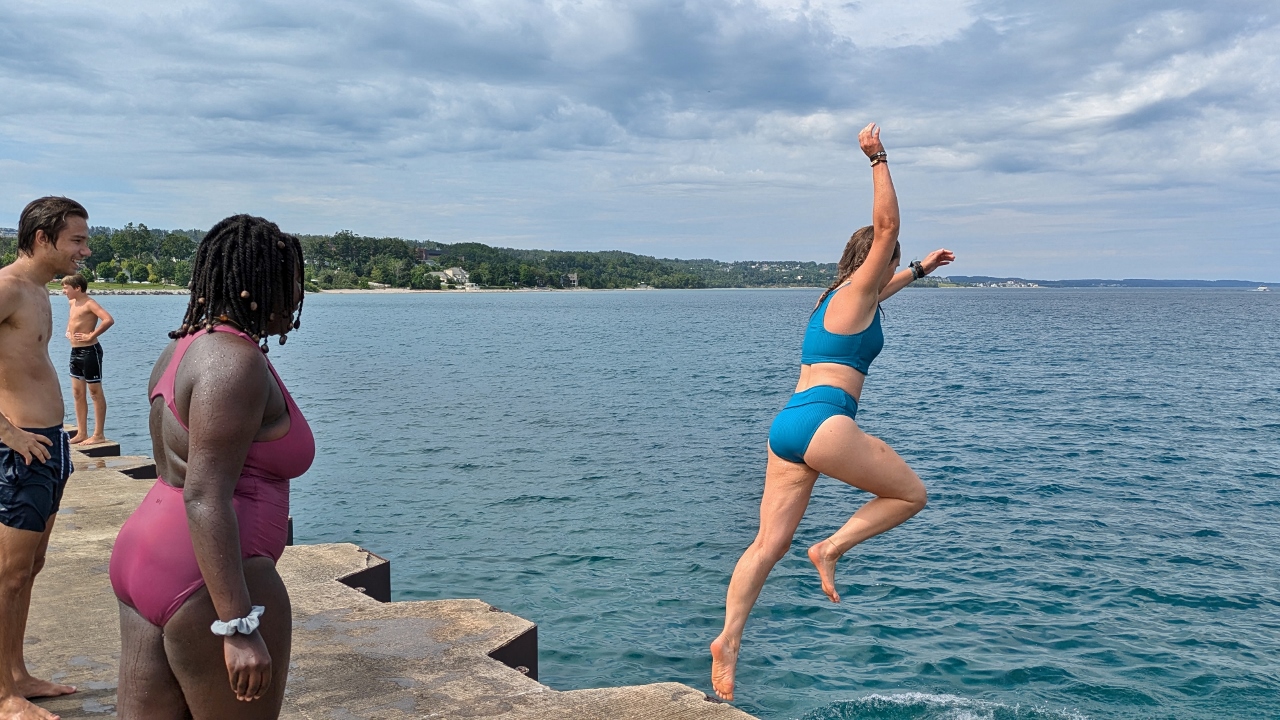 Fun Times Jumping Off Pier at Petoskey Light