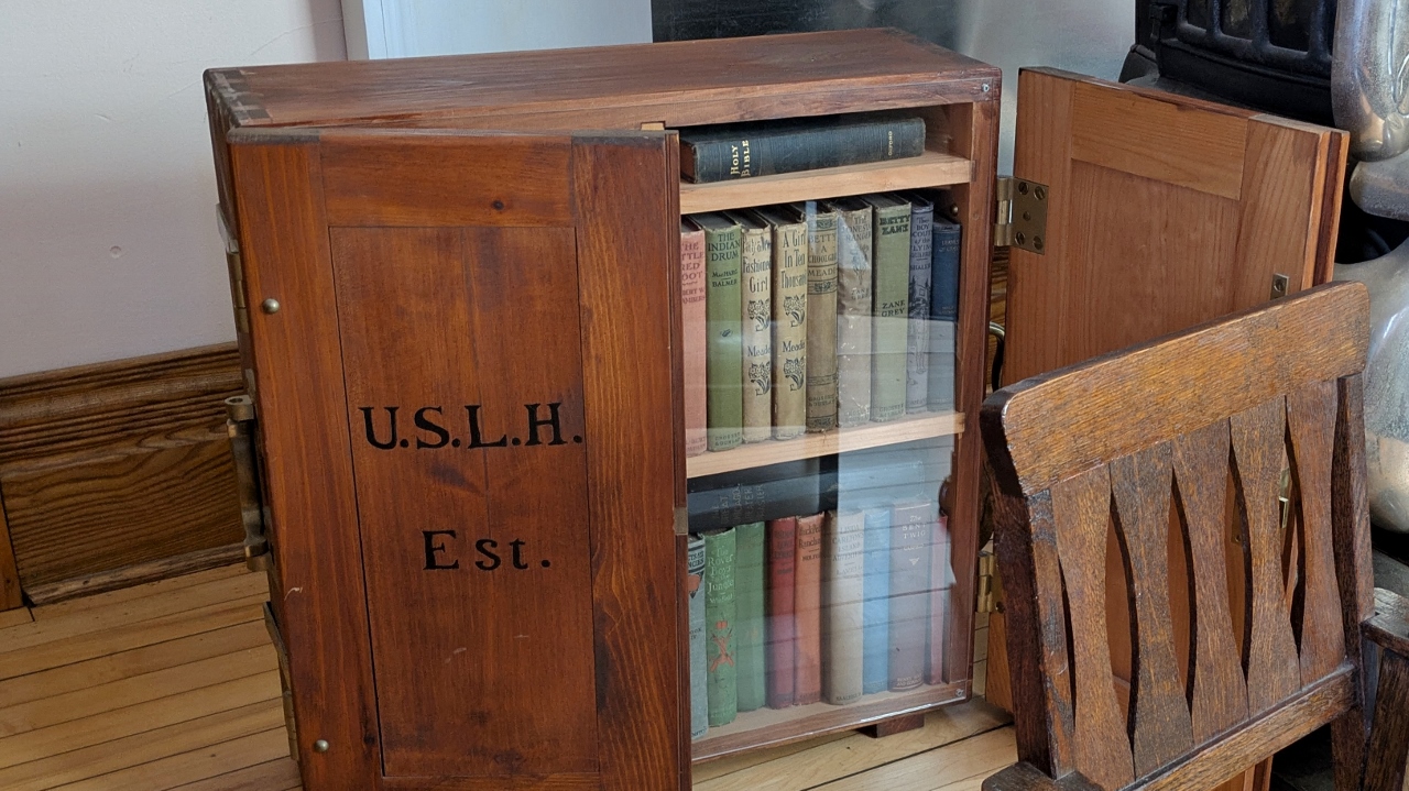 Circulating Lighthouse Library Contained in a Wooden Case