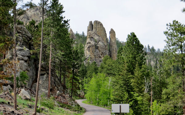 Needles Highway Threads its way among Granite Peaks