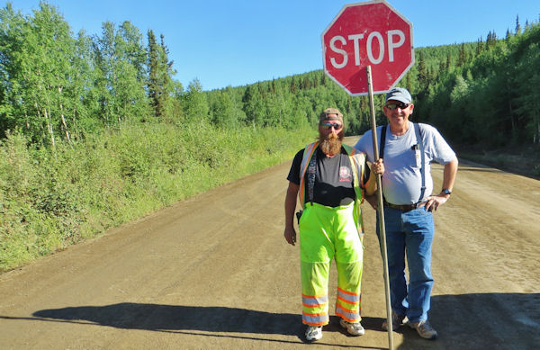 California Roadside Ray Flags Traffic for Construction on Dalton Highway