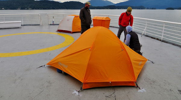 People Pitch Tents on Aft Deck of Ferries Using Duct Tape Instead of Stakes