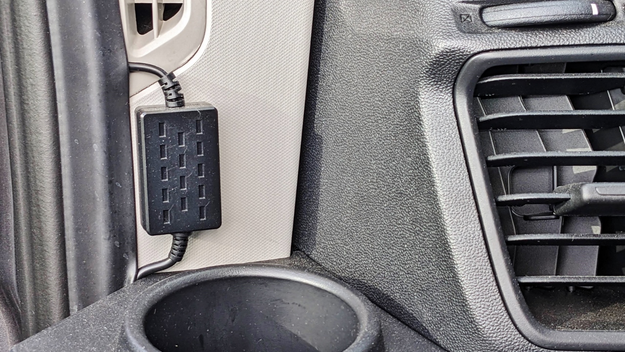 Power Module Mounted in Front of Driver Side Cup Holder