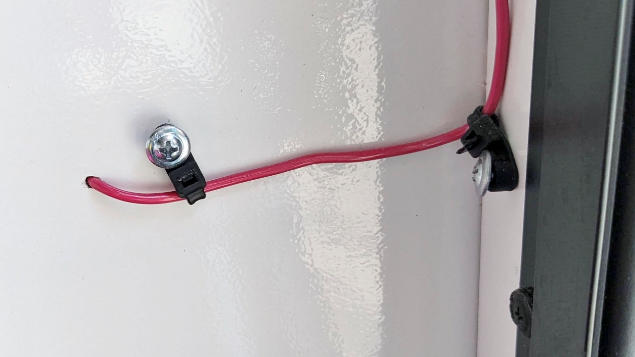 Backup Light Sensor Wire Routed from Taillight Through Garage Wall to Ceiling
