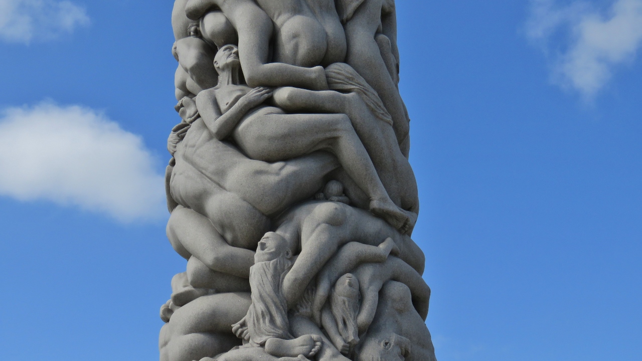 Monolith Depicts 121 Humans Clinging to Each Other