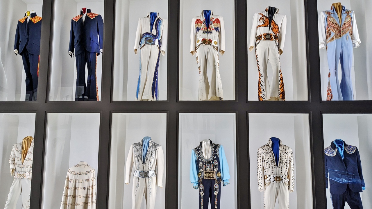 A Few of Many Dozens of Elvis Costumes on Display