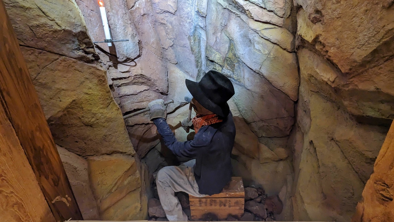 Miner at Work with Four Pound Hammer and Drill by Candlelight