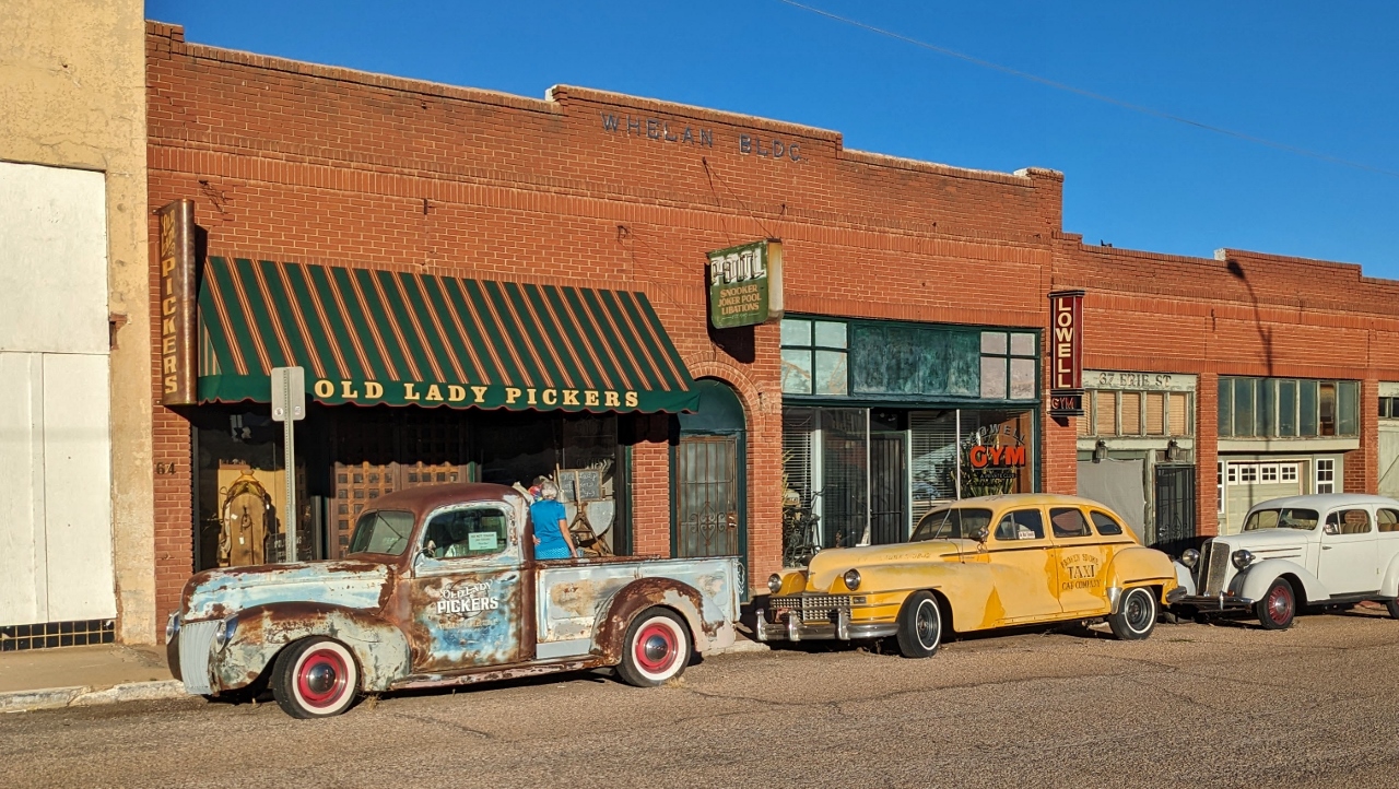 Cars in Front of Old Lady Pickers Antiques